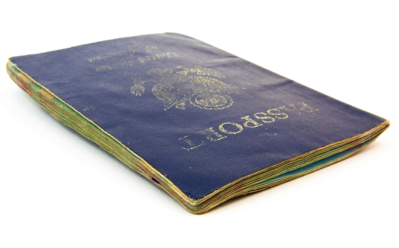 Close-up of a water-damaged passport.